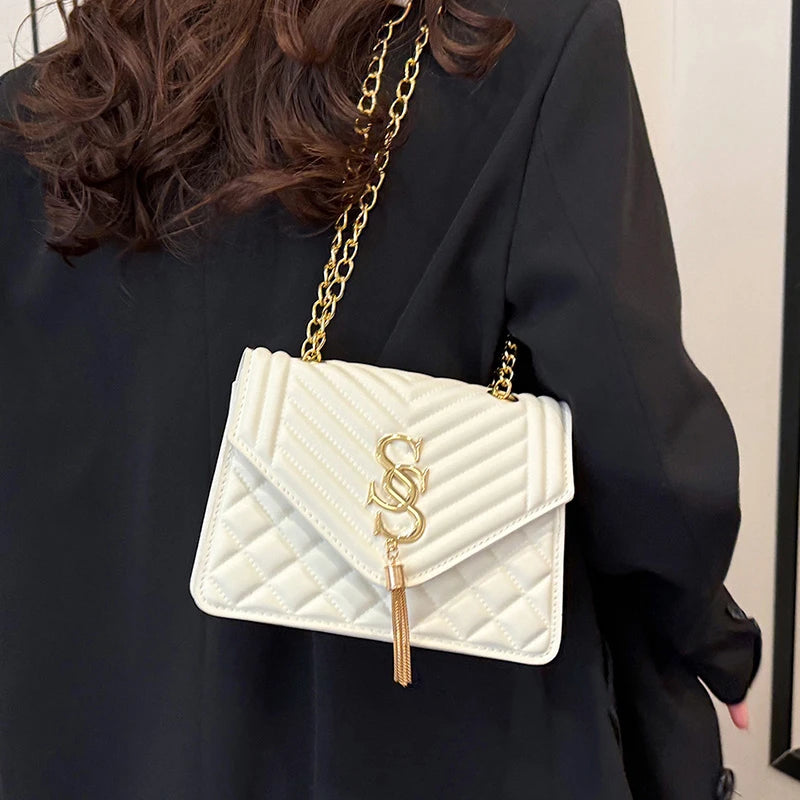 Glow Unbound LLC argyle quilted square crossbody bag