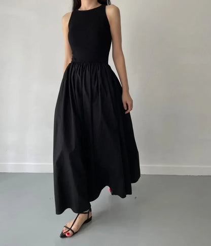 Glow Unbound LLC black midi dress with round neckline