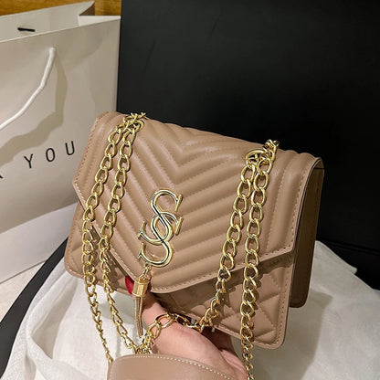 Glow Unbound LLC argyle quilted square crossbody bag