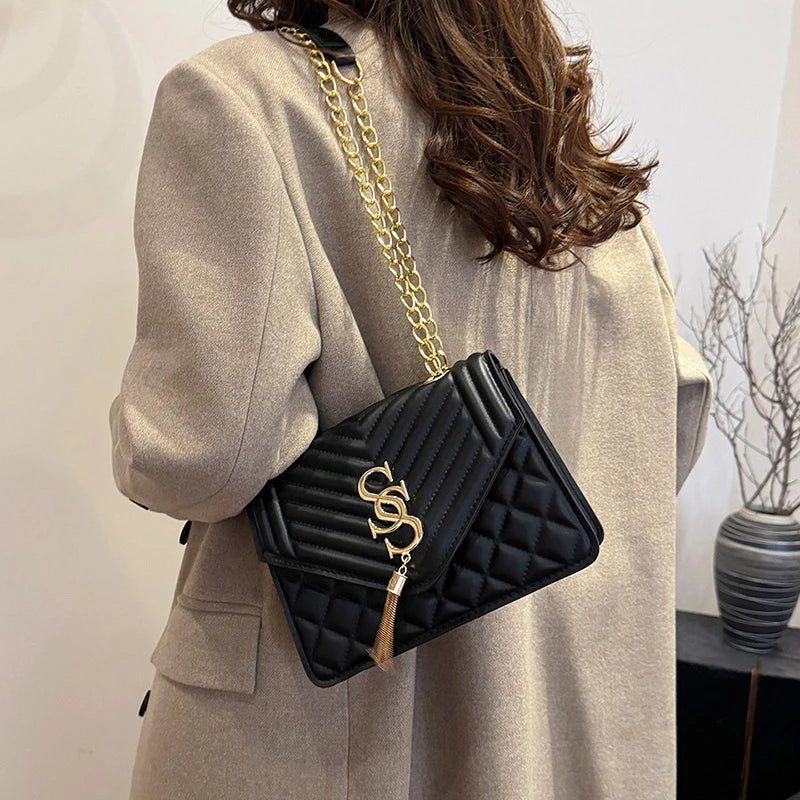 Glow Unbound LLC argyle quilted square crossbody bag