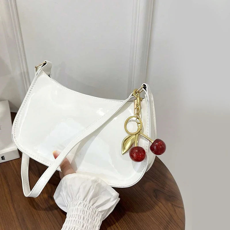 Glow Unbound LLC PU leather cherry pendant shoulder bag
