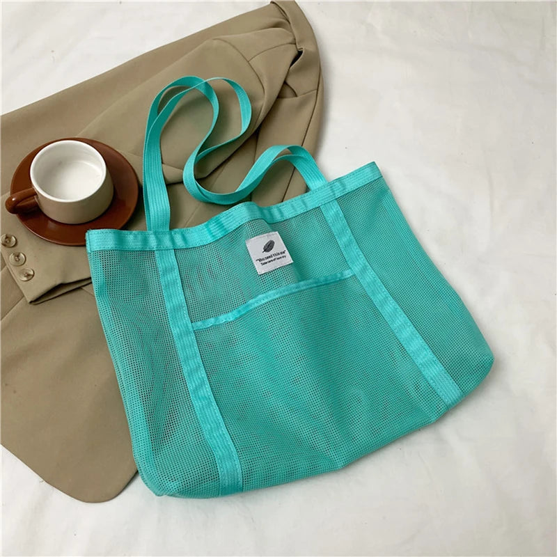 Glow Unbound LLC transparent mesh shoulder tote bag