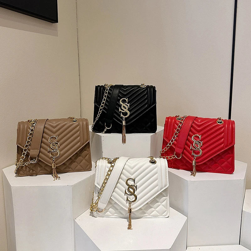 Glow Unbound LLC argyle quilted square crossbody bag